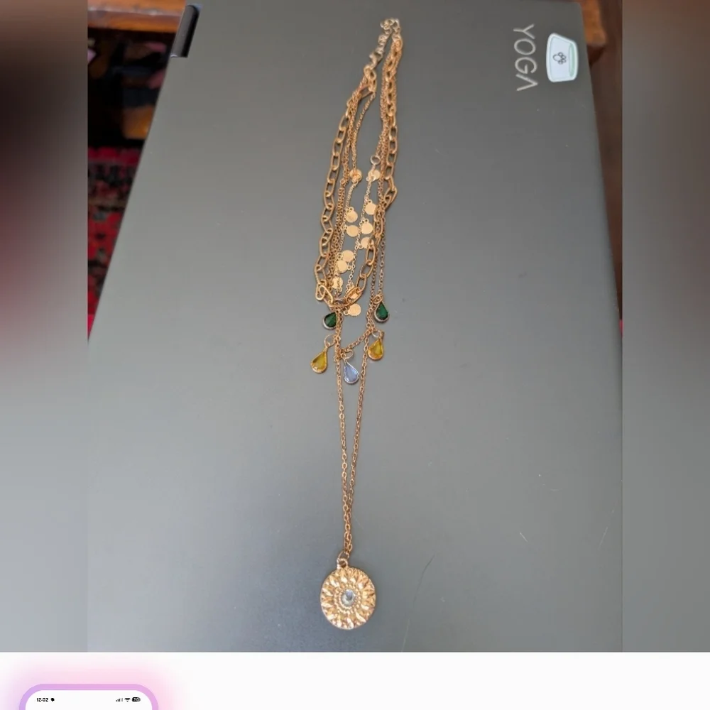 Elegant Triple-Strand Necklace in Coppery Metal with Crystal Teardrops